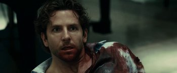 Movie still from “Limitless” (2011), directed by Neil Burger – A person with blood all over his body; Close Up shot, Over the shoulder angle