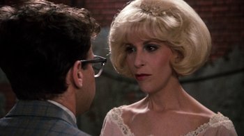 Movie still from “Little Shop of Horrors” (1986), directed by Frank Oz – A man and a woman looking at one another; Close Up shot, Over the shoulder angle