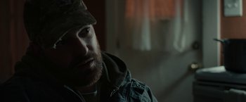 Movie still from “Little Woods” (2018), directed by Nia DaCosta – A person wearing a hat; Close Up shot, Over the shoulder angle