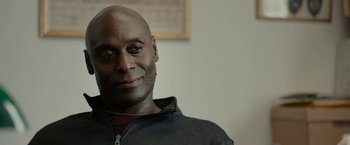 Movie still from “Little Woods” (2018), directed by Nia DaCosta – A person wearing a black jacket; Close Up shot, Over the shoulder angle