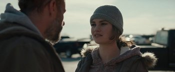 Movie still from “Little Woods” (2018), directed by Nia DaCosta – A man and a woman talking to each other outside; Close Up shot, Over the shoulder angle