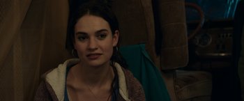 Movie still from “Little Woods” (2018), directed by Nia DaCosta – A young woman is sitting in front of a mirror; Close Up shot, Over the shoulder angle