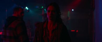 Movie still from “Little Woods” (2018), directed by Nia DaCosta – A woman standing in a dark room at night; Close Up shot, Low angle