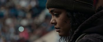 Movie still from “Little Woods” (2018), directed by Nia DaCosta – A person wearing a hat; Close Up shot, Low angle