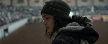 Movie still from “Little Woods” (2018), directed by Nia DaCosta – A woman wearing a hat and a jacket; Close Up shot, Over the shoulder angle