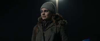 Movie still from “Little Woods” (2018), directed by Nia DaCosta – A woman wearing a winter coat and a hat; Close Up shot, Over the shoulder angle
