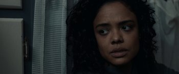 Movie still from “Little Woods” (2018), directed by Nia DaCosta – A young woman is looking at the camera; Close Up shot, Over the shoulder angle