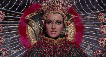 Movie still from “Live and Let Die” (1973), directed by Guy Hamilton – A person wearing a costume; Close Up shot, Low angle