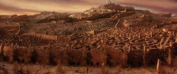 Movie still from “Labyrinth” (1986), directed by Jim Henson – An image of an ancient city in the middle of the desert; Extreme Wide shot, High angle