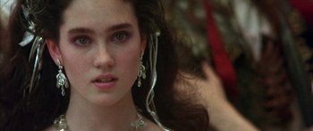 Movie still from “Labyrinth” (1986), directed by Jim Henson – A woman's face with long hair; Close Up shot, Over the shoulder angle