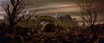 Movie still from “Labyrinth” (1986), directed by Jim Henson – An image of a castle in the middle of a field; Extreme Wide shot, High angle
