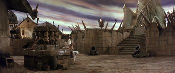 Movie still from “Labyrinth” (1986), directed by Jim Henson – An image of a scene in a movie setting; Extreme Wide shot, High angle