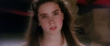 Movie still from “Labyrinth” (1986), directed by Jim Henson – A person with long hair; Close Up shot, Over the shoulder angle