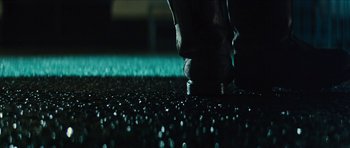 Movie still from “Locke” (2013), directed by Steven Knight – A person's foot on the ground at night; Extreme Close Up shot, Low angle