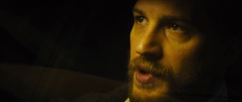 Movie still from “Locke” (2013), directed by Steven Knight – A person with a beard; Close Up shot, Over the shoulder angle