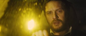 Movie still from “Locke” (2013), directed by Steven Knight – A person with a light in their hand; Close Up shot, Low angle