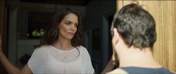 Movie still from “Logan Lucky” (2017), directed by Steven Soderbergh – A woman looking in the mirror while standing in front of a mirror; Close Up shot, Over the shoulder angle