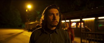 Movie still from “Logan Lucky” (2017), directed by Steven Soderbergh – A person with long hair; Close Up shot, Over the shoulder angle