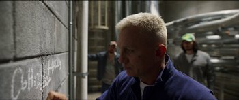 Movie still from “Logan Lucky” (2017), directed by Steven Soderbergh – A person with a white hair; Close Up shot, Over the shoulder angle