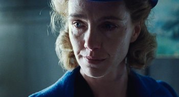 Movie still from “Lore” (2012), directed by Cate Shortland – A person wearing a blue jacket; Close Up shot, Low angle