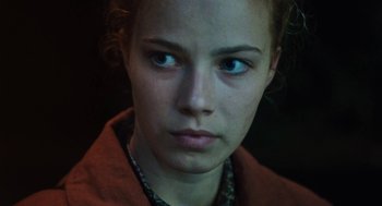 Movie still from “Lore” (2012), directed by Cate Shortland – A person with blue eyes; Close Up shot, Low angle