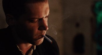 Movie still from “Lore” (2012), directed by Cate Shortland – A person smoking a cigarette; Close Up shot, Low angle