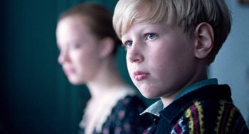 Movie still from “Lore” (2012), directed by Cate Shortland – A boy and a girl standing next to each other; Close Up shot, Low angle