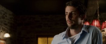 Movie still from “Leap Year” (2010), directed by Anand Tucker – A person wearing a dress shirt; Close Up shot, Over the shoulder angle