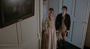 Movie still from “Love & Friendship” (2016), directed by Whit Stillman – A man and a woman dressed in period clothing; Wide shot, High angle