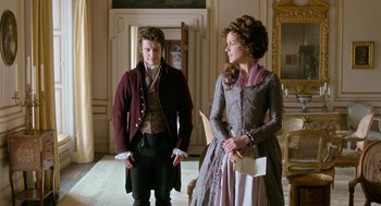 Movie still from “Love & Friendship” (2016), directed by Whit Stillman – A man and a woman dressed in period clothing; Medium shot, Over the shoulder angle