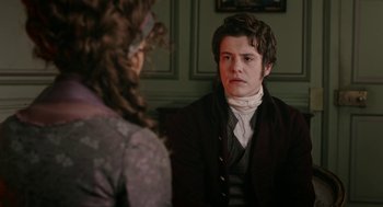 Movie still from “Love & Friendship” (2016), directed by Whit Stillman – A man in a suit and a wig looking at a woman in a dress; Close Up shot, Over the shoulder angle