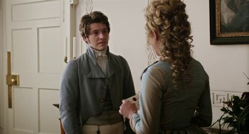Movie still from “Love & Friendship” (2016), directed by Whit Stillman – A man and a woman are looking at each other; Medium shot, Over the shoulder angle