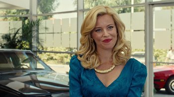 Movie still from “Love & Mercy” (2014), directed by Bill Pohlad – A woman with blonde hair wearing a blue dress; Close Up shot, Over the shoulder angle