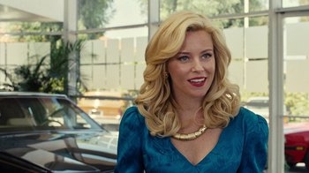 Movie still from “Love & Mercy” (2014), directed by Bill Pohlad – A woman with blonde hair wearing a blue dress; Close Up shot, Over the shoulder angle