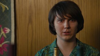 Movie still from “Love & Mercy” (2014), directed by Bill Pohlad – A person with a trumpet in a room; Close Up shot, Over the shoulder angle