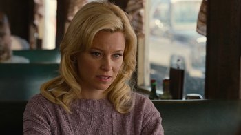 Movie still from “Love & Mercy” (2014), directed by Bill Pohlad – A woman with blonde hair sitting in front of a window; Close Up shot, Over the shoulder angle