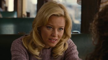 Movie still from “Love & Mercy” (2014), directed by Bill Pohlad – A woman with blonde hair sitting in front of a window; Close Up shot, Over the shoulder angle