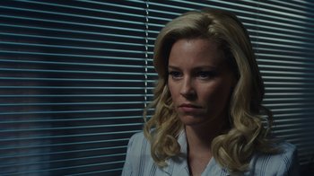 Movie still from “Love & Mercy” (2014), directed by Bill Pohlad – A woman with blonde curly hair and a white shirt; Close Up shot, Over the shoulder angle