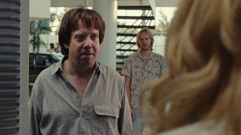 Movie still from “Love & Mercy” (2014), directed by Bill Pohlad – A man and a woman looking in the same direction in the mirror; Close Up shot, Over the shoulder angle