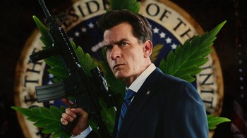 Movie still from “Machete Kills” (2013), directed by Robert Rodriguez – A man in a suit and tie holding a gun; Close Up shot, Low angle