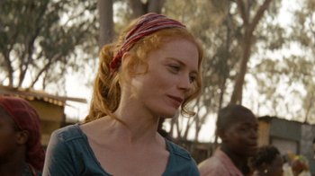 Movie still from “Machine Gun Preacher” (2011), directed by Marc Forster – A person wearing a head scarf; Close Up shot, Over the shoulder angle