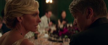 Movie still from “Madame” (2017), directed by Amanda Sthers – Two people sitting at a dinner table talking to each other; Close Up shot, Over the shoulder angle