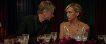 Movie still from “Madame” (2017), directed by Amanda Sthers – A man and a woman sitting at a dinner table; Close Up shot, Over the shoulder angle