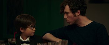 Movie still from “Madame” (2017), directed by Amanda Sthers – A man and a woman sitting at a dinner table; Close Up shot, Over the shoulder angle