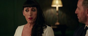 Movie still from “Madame” (2017), directed by Amanda Sthers – A person with long black hair; Close Up shot, Over the shoulder angle