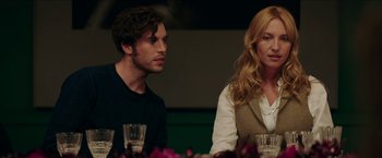 Movie still from “Madame” (2017), directed by Amanda Sthers – A man and a woman sitting at a dinner table; Close Up shot, Over the shoulder angle