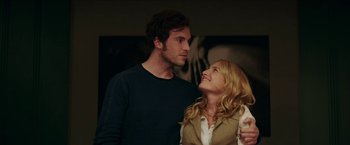 Movie still from “Madame” (2017), directed by Amanda Sthers – A man and a woman standing next to each other; Close Up shot, Over the shoulder angle