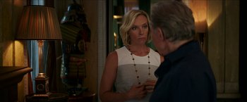 Movie still from “Madame” (2017), directed by Amanda Sthers – A woman in a white dress talking to a man in a black shirt; Medium shot, Over the shoulder angle