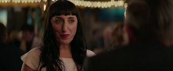 Movie still from “Madame” (2017), directed by Amanda Sthers – A person with long black hair; Close Up shot, Over the shoulder angle