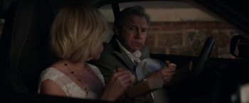 Movie still from “Madame” (2017), directed by Amanda Sthers – A man and a woman in the back of a car; Close Up shot, Over the shoulder angle